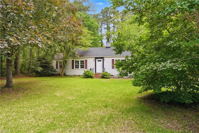 116 Sycamore Rd, Franklin, VA 23851 - view of front of house featuring a front lawn and a chimney