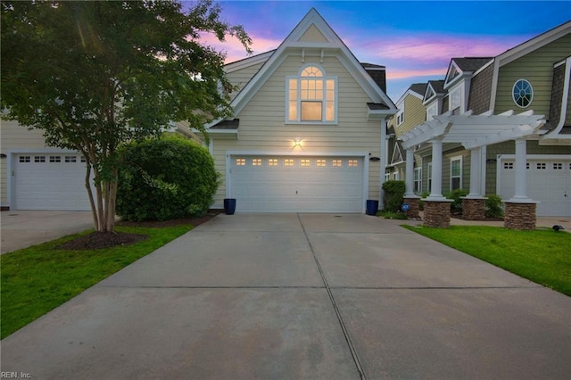 107 Hamilton Ct, Suffolk, VA 23435 - view of front of house with a pergola, concrete driveway, and a garage
