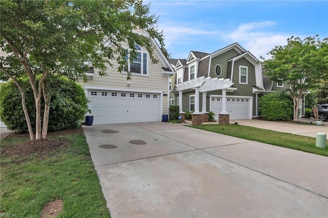 107 Hamilton Ct, Suffolk, VA 23435 - view of front of house with a garage, driveway, and a pergola