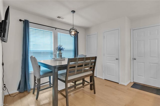 107 Hamilton Ct, Suffolk, VA 23435 - dining room featuring light wood-type flooring and baseboards