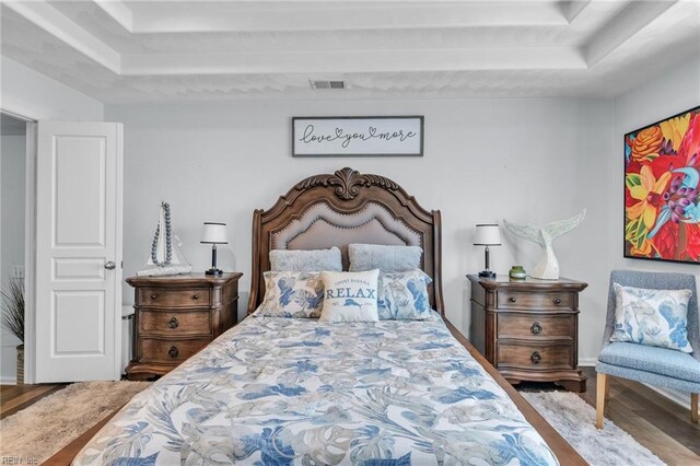 107 Hamilton Ct, Suffolk, VA 23435 - bedroom featuring wood finished floors and a raised ceiling
