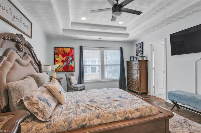 107 Hamilton Ct, Suffolk, VA 23435 - bedroom featuring wood finished floors, a tray ceiling, a ceiling fan, and recessed lighting