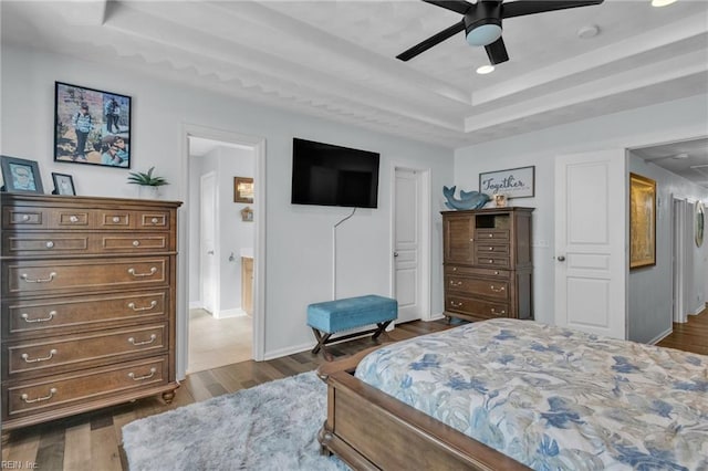 107 Hamilton Ct, Suffolk, VA 23435 - bedroom featuring a raised ceiling, dark wood-style floors, ceiling fan, and baseboards