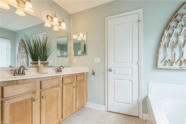 107 Hamilton Ct, Suffolk, VA 23435 - bathroom with tile patterned flooring, a bath, and double vanity