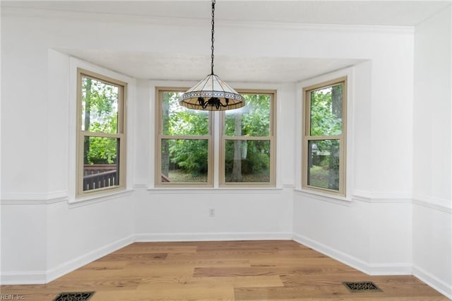 25 Hunter Trce, Hampton, VA 23669 - unfurnished dining area featuring a chandelier, light wood finished floors, and baseboards