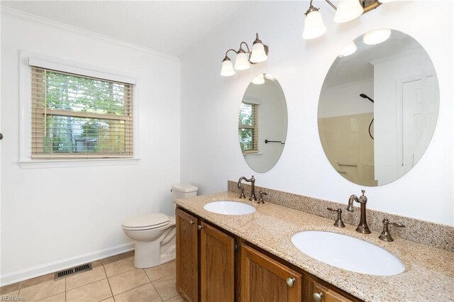 25 Hunter Trce, Hampton, VA 23669 - full bath with tile patterned flooring, toilet, double vanity, baseboards, and crown molding