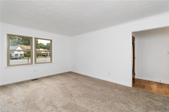 25 Hunter Trce, Hampton, VA 23669 - unfurnished room with carpet floors, a textured ceiling, and baseboards