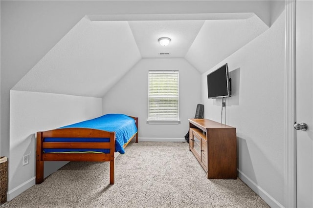 3925 Grand Isle Dr, Chesapeake, VA 23323 - carpeted bedroom featuring vaulted ceiling and baseboards