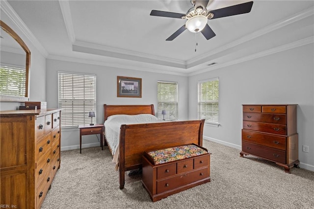 3925 Grand Isle Dr, Chesapeake, VA 23323 - bedroom featuring a tray ceiling, multiple windows, light carpet, ornamental molding, and baseboards