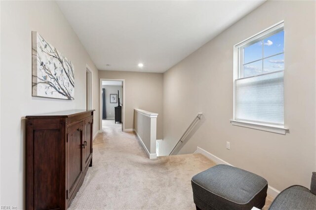 1430 Poquoson Ave, Poquoson, VA 23662 - hallway featuring an upstairs landing, light colored carpet, baseboards, and recessed lighting