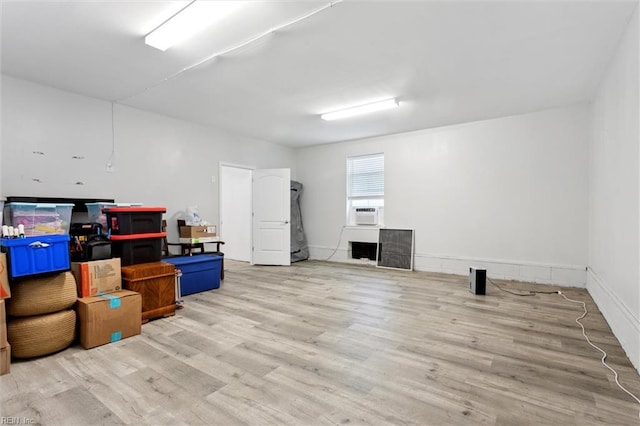 1430 Poquoson Ave, Poquoson, VA 23662 - below grade area featuring wood finished floors and cooling unit