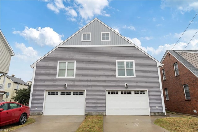 1278 Little Bay Ave Unit B, Norfolk, VA 23503 - view of front of house featuring concrete driveway and an attached garage