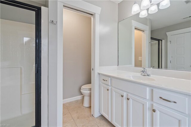 1278 Little Bay Ave Unit B, Norfolk, VA 23503 - bathroom featuring toilet, baseboards, a shower stall, vanity, and tile patterned floors