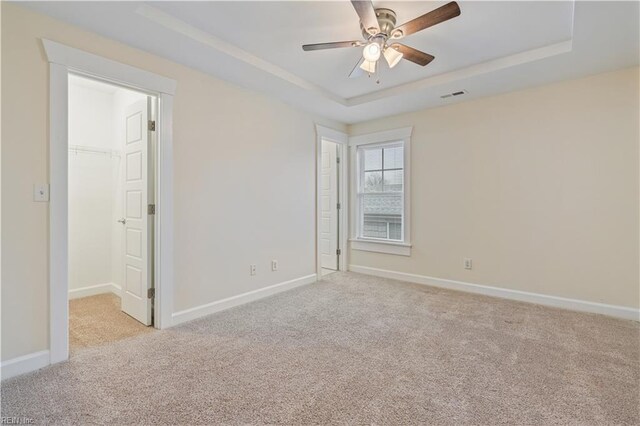 1278 Little Bay Ave Unit B, Norfolk, VA 23503 - carpeted spare room featuring a ceiling fan, a tray ceiling, and baseboards