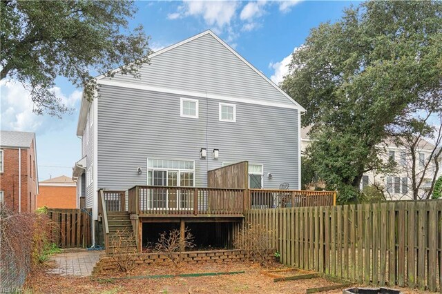 1278 Little Bay Ave Unit B, Norfolk, VA 23503 - rear view of house featuring a fenced backyard and a wooden deck