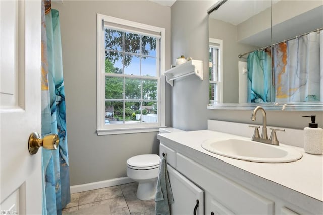 155 Wilderness Rd, Hampton, VA 23669 - bathroom with toilet, baseboards, vanity, and curtained shower