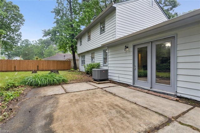 155 Wilderness Rd, Hampton, VA 23669 - view of patio featuring central AC and fence