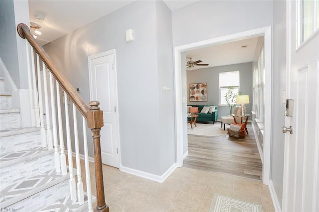 1060 Fairgrounds Ln, Suffolk, VA 23434 - foyer with stairway, ceiling fan, baseboards, and light tile patterned floors