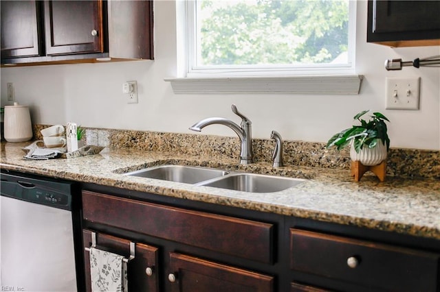 1060 Fairgrounds Ln, Suffolk, VA 23434 - kitchen with stainless steel dishwasher, a sink, healthy amount of natural light, and dark brown cabinets