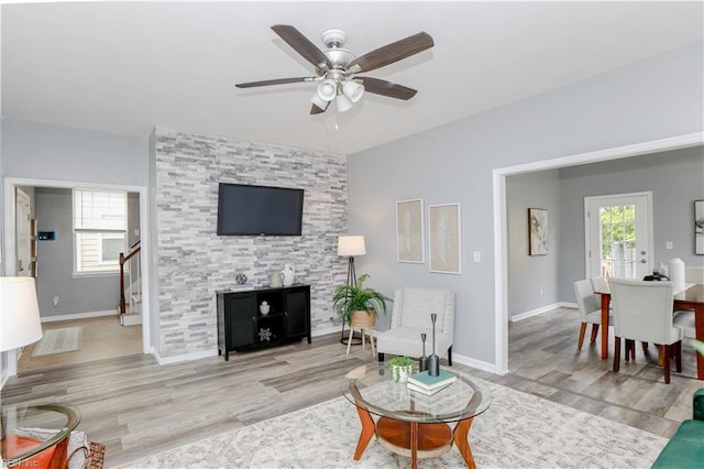 1060 Fairgrounds Ln, Suffolk, VA 23434 - living area with a ceiling fan, wood finished floors, stairs, and baseboards