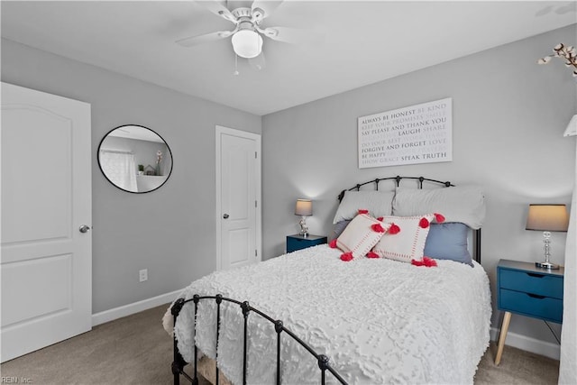 bedroom featuring carpet, baseboards, and ceiling fan