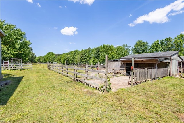 view of yard with an exterior structure and an outdoor structure