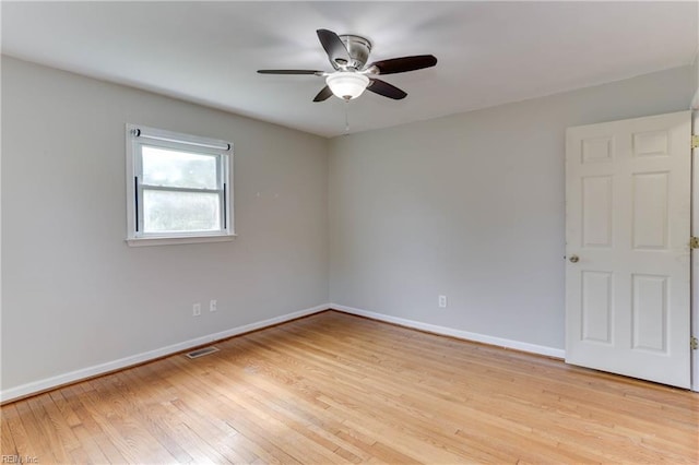49 Church St, Poquoson, VA 23662 - empty room featuring baseboards, ceiling fan, and light wood-type flooring