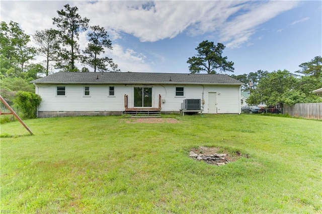 49 Church St, Poquoson, VA 23662 - rear view of house featuring central air condition unit
