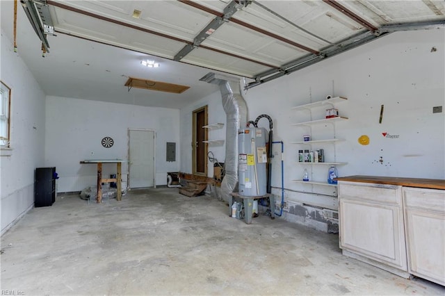 49 Church St, Poquoson, VA 23662 - garage featuring water heater and electric panel