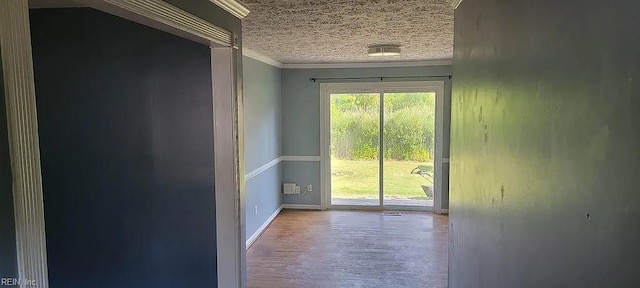 49 Church St, Poquoson, VA 23662 - entryway with crown molding, wood finished floors, a textured ceiling, and baseboards