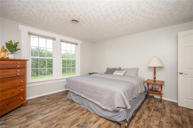 13542 Brink Rd, Emporia, VA 23847 - bedroom with wood finished floors and baseboards
