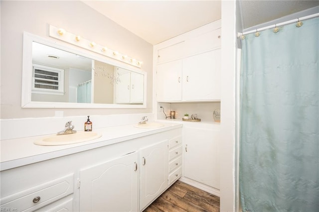 13542 Brink Rd, Emporia, VA 23847 - full bath with wood finished floors and double vanity