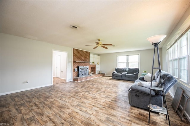 13542 Brink Rd, Emporia, VA 23847 - living area with wood finished floors, a ceiling fan, and baseboards