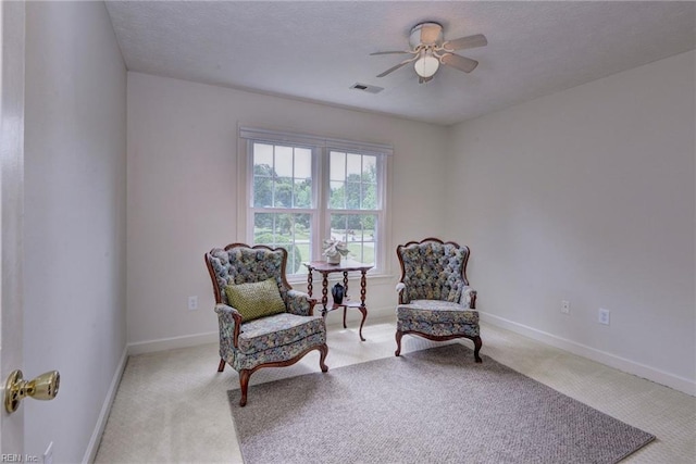 4901 Toddington Cir, Williamsburg, VA 23188 - sitting room featuring a ceiling fan, light carpet, and baseboards