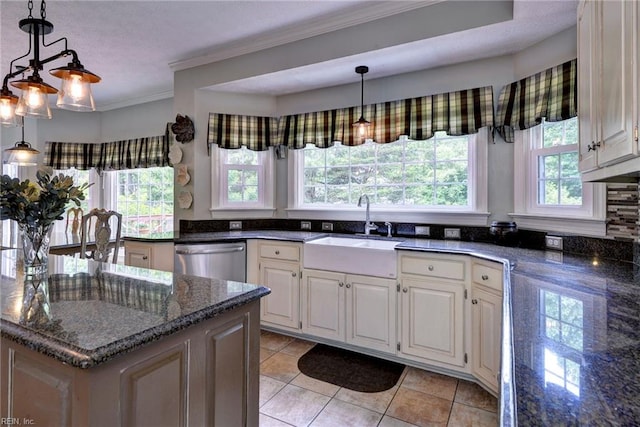4901 Toddington Cir, Williamsburg, VA 23188 - kitchen featuring dishwasher, a sink, light tile patterned floors, dark stone countertops, and ornamental molding