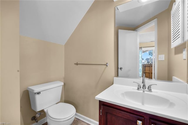 5217 Bardith Cir, Virginia Beach, VA 23455 - bathroom featuring toilet, vanity, baseboards, and vaulted ceiling