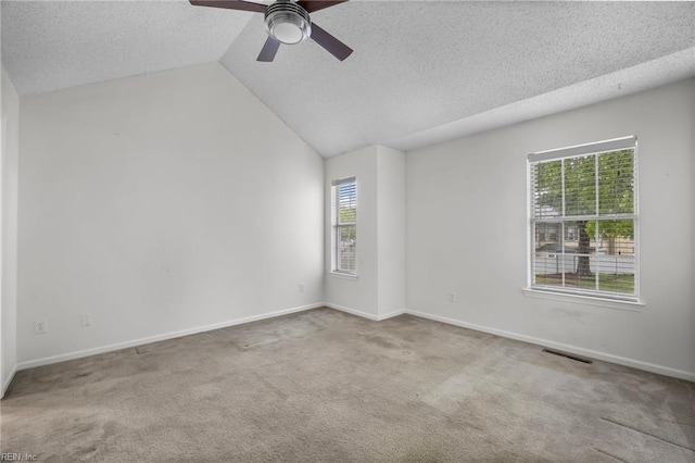 5217 Bardith Cir, Virginia Beach, VA 23455 - empty room featuring carpet floors, ceiling fan, a textured ceiling, vaulted ceiling, and baseboards