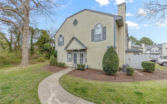 5217 Bardith Cir, Virginia Beach, VA 23455 - view of front facade with a chimney and central AC unit