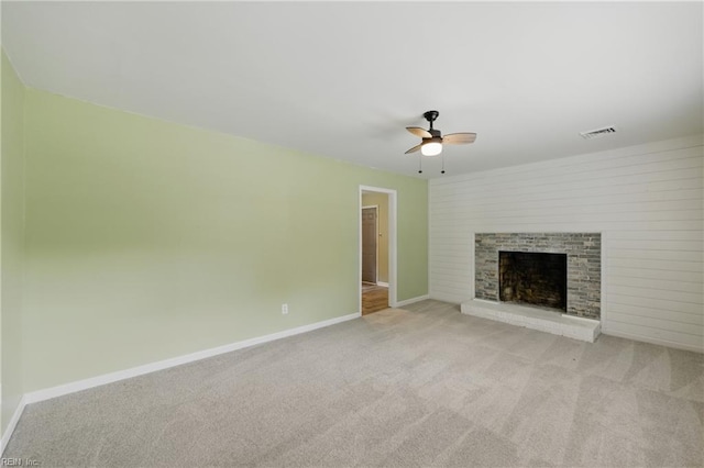 725 Forest Trl, Virginia Beach, VA 23452 - unfurnished living room featuring a ceiling fan, light colored carpet, and a brick fireplace