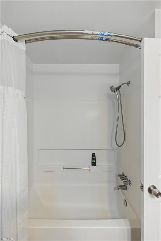 725 Forest Trl, Virginia Beach, VA 23452 - bathroom featuring shower / bath combo with shower curtain