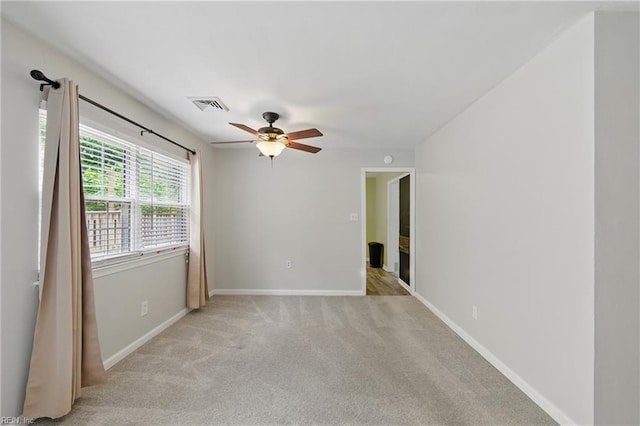 725 Forest Trl, Virginia Beach, VA 23452 - spare room featuring light colored carpet, ceiling fan, and baseboards