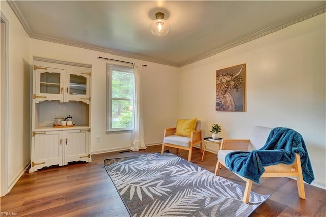 1305 Oak Ridge Dr, Chesapeake, VA 23322 - living area featuring crown molding, wood finished floors, and baseboards
