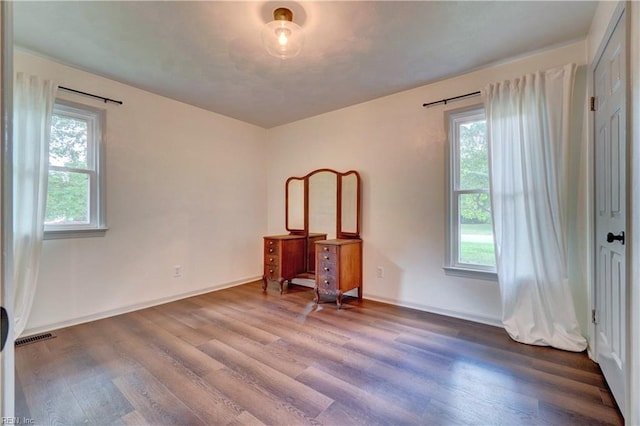 1305 Oak Ridge Dr, Chesapeake, VA 23322 - unfurnished bedroom featuring wood finished floors and baseboards