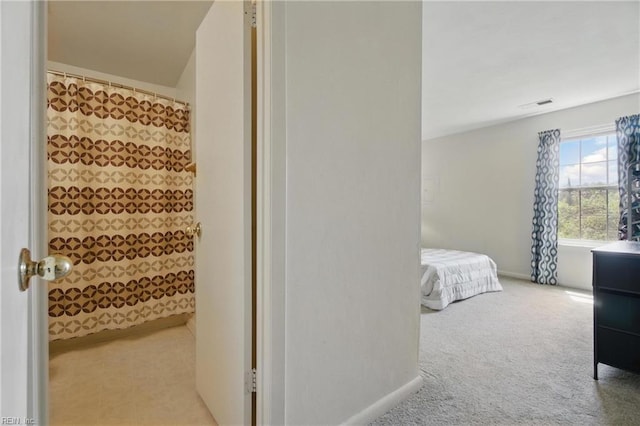 full bathroom featuring baseboards