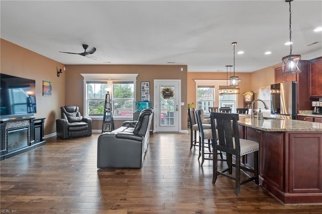 121 Algonquin Trl, Shawboro, NC 27973 - living area with recessed lighting, a fireplace, healthy amount of natural light, ceiling fan, and dark wood-style floors