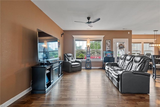 121 Algonquin Trl, Shawboro, NC 27973 - living room with ceiling fan, dark wood-style flooring, and baseboards