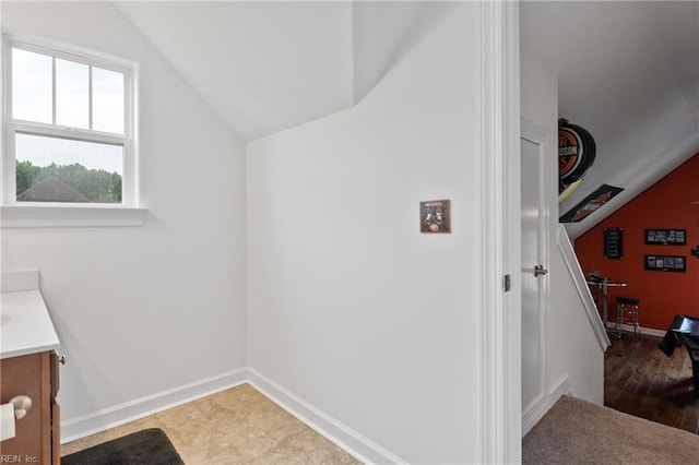 121 Algonquin Trl, Shawboro, NC 27973 - bathroom featuring lofted ceiling, vanity, and baseboards