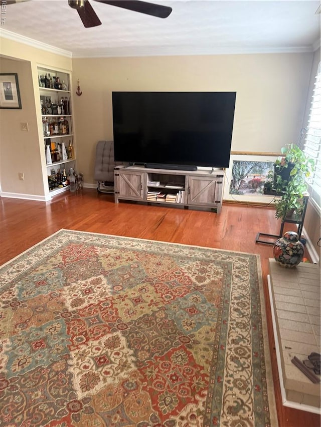 4705 Kempsville Green Parkway, Virginia Beach, VA 23462 - living room with wood finished floors, a ceiling fan, ornamental molding, baseboards, and built in features