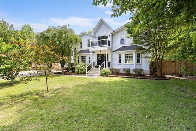 2740 Duckwood Ct, Suffolk, VA 23435 - traditional-style home featuring a balcony