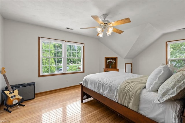 2740 Duckwood Ct, Suffolk, VA 23435 - bedroom with wood-type flooring, a ceiling fan, baseboards, and lofted ceiling